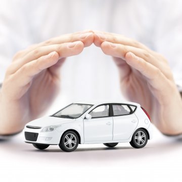 root car insurance car insurance hands protecting white car toy 